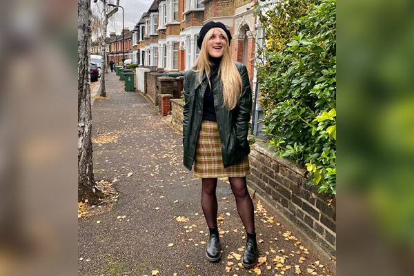 Turtleneck And Pleated Skirt